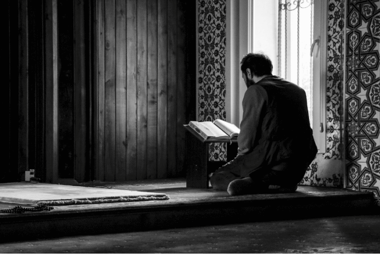 The Holy Qur’an resting on a wooden rehal, symbolizing daily spiritual reflection and closeness to Allah.