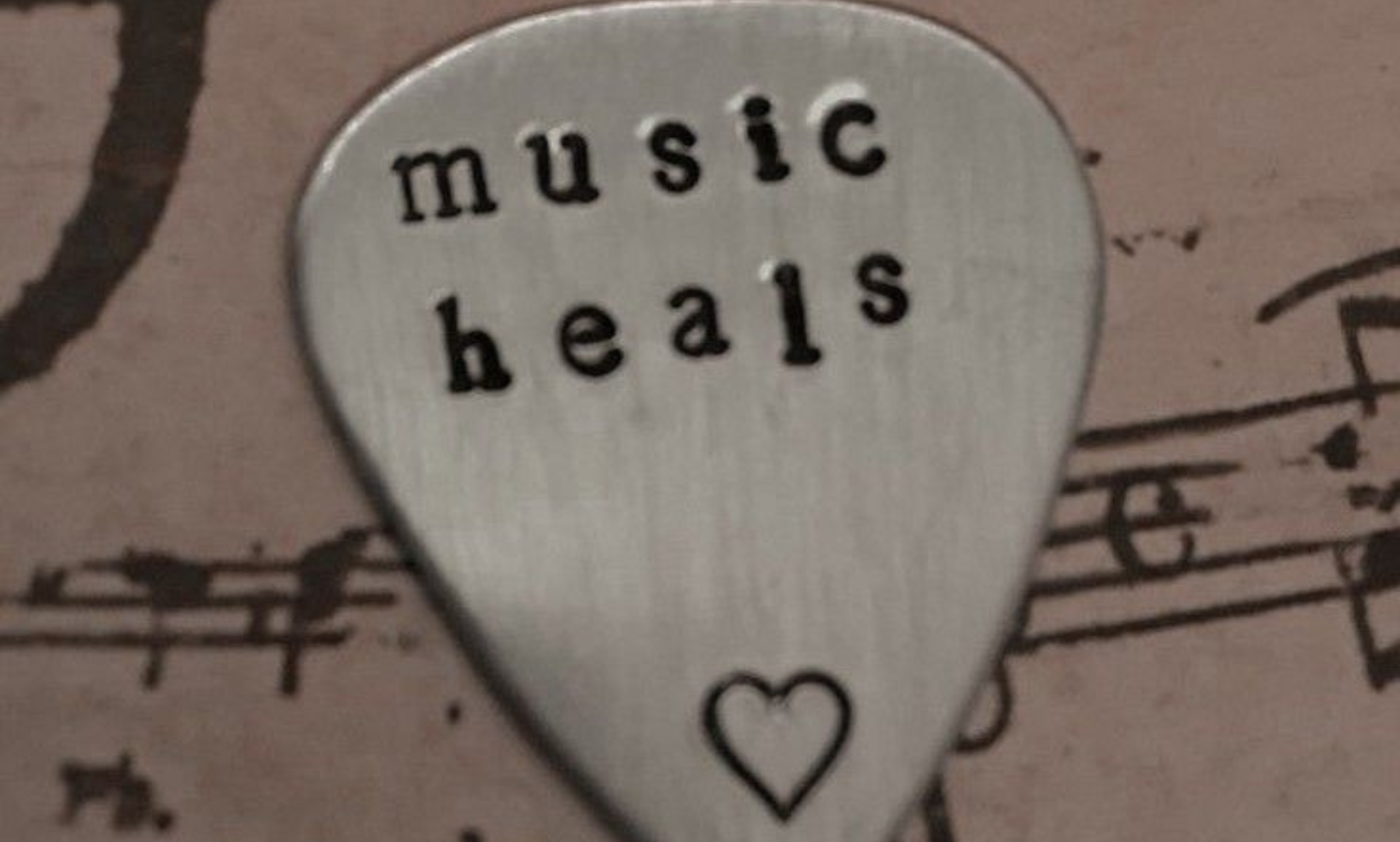 Music heals the mind and soul, symbolizing stress relief and emotional balance through sound